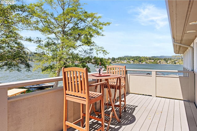 2941 NE Loop Dr, Otis, OR 97368 - wooden deck with a water view