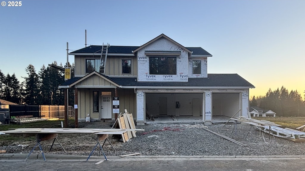 view of front of property with a garage