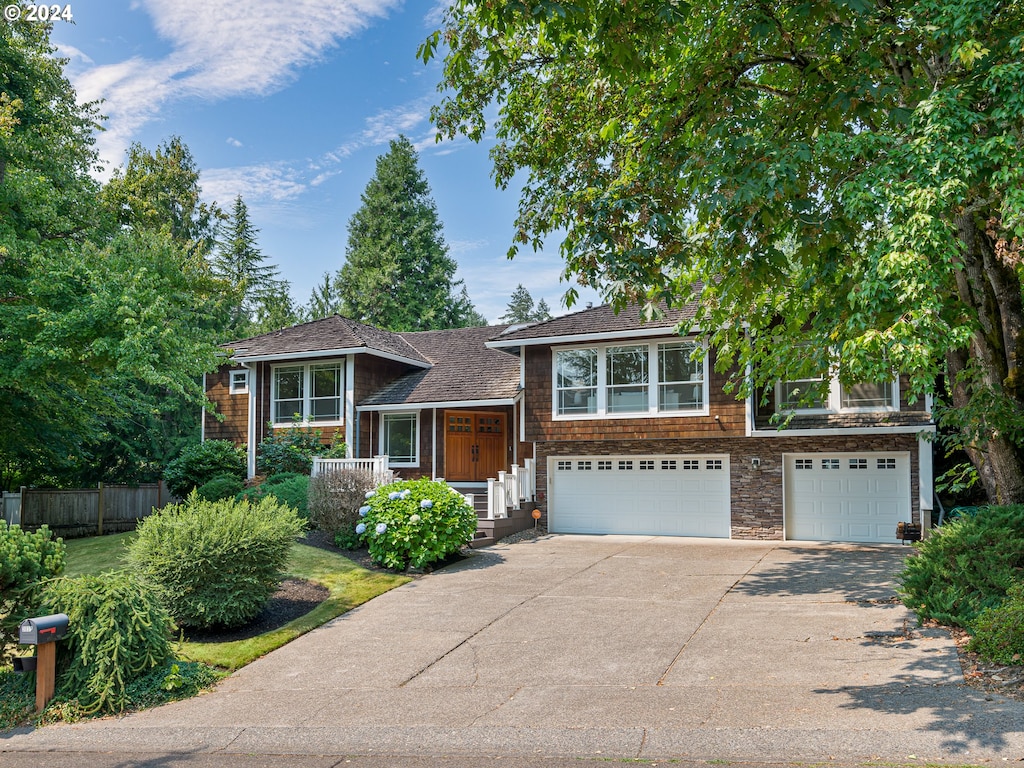 split level home featuring a garage