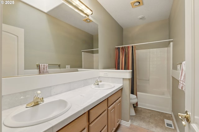 10802 SE Happy Valley Dr, Happy Valley, OR 97086 - bathroom featuring toilet, double vanity, shower / bath combination with curtain, and tile patterned floors