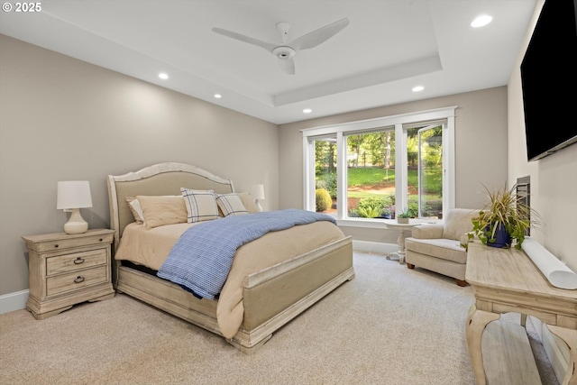 28800 SW Wildhaven Ln, Hillsboro, OR 97123 - bedroom with recessed lighting, light colored carpet, baseboards, a ceiling fan, and a raised ceiling