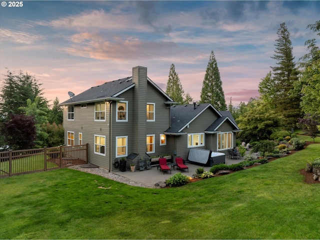 28800 SW Wildhaven Ln, Hillsboro, OR 97123 - back of house with a patio, a gate, and a chimney