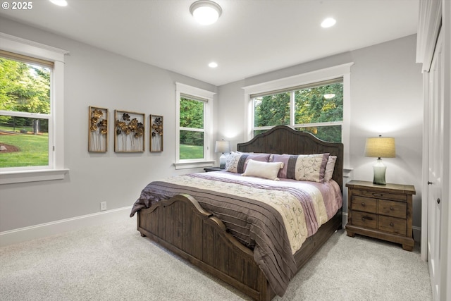 28800 SW Wildhaven Ln, Hillsboro, OR 97123 - carpeted bedroom with multiple windows, recessed lighting, and baseboards