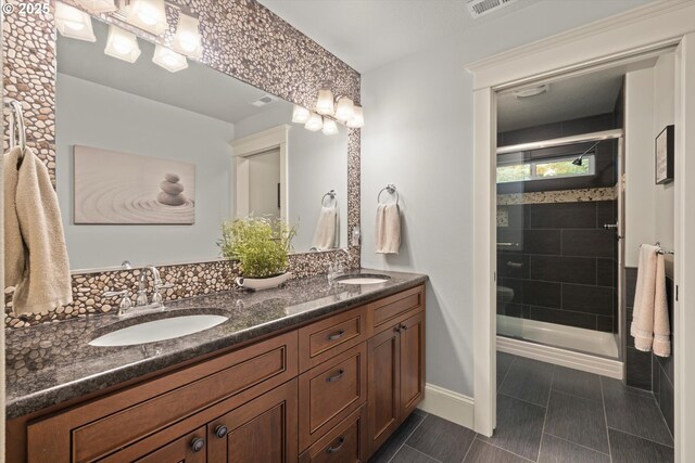 28800 SW Wildhaven Ln, Hillsboro, OR 97123 - full bath featuring double vanity, a shower stall, and tile patterned flooring