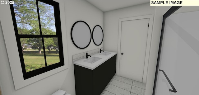 bathroom with tile patterned flooring and vanity