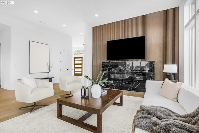 living room with light hardwood / wood-style flooring