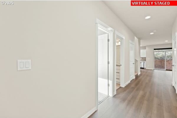 10587 SE Webelos Way, Happy Valley, OR 97086 - corridor featuring wood finished floors and recessed lighting