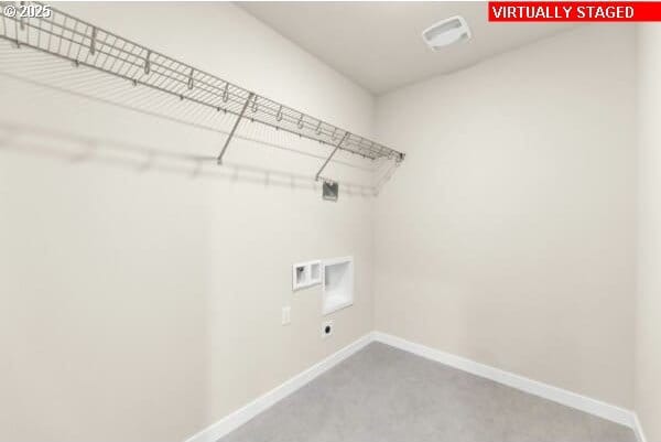 10587 SE Webelos Way, Happy Valley, OR 97086 - laundry area featuring washer hookup, carpet, and electric dryer hookup