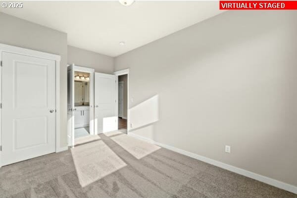 10587 SE Webelos Way, Happy Valley, OR 97086 - unfurnished bedroom with carpet floors