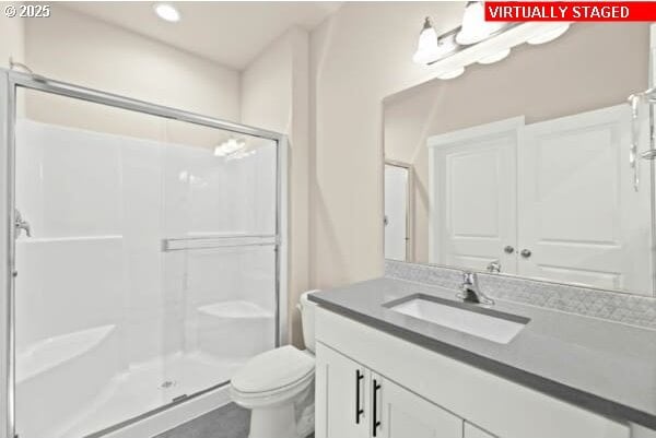 10587 SE Webelos Way, Happy Valley, OR 97086 - full bathroom with a shower stall, vanity, and recessed lighting
