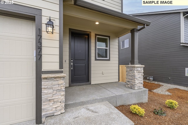 property entrance featuring covered porch