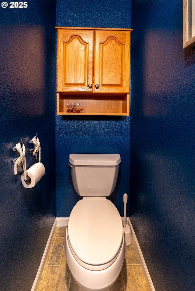 43605 State Highway 38 Unit 41, Reedsport, OR 97467 - bathroom featuring toilet and baseboards
