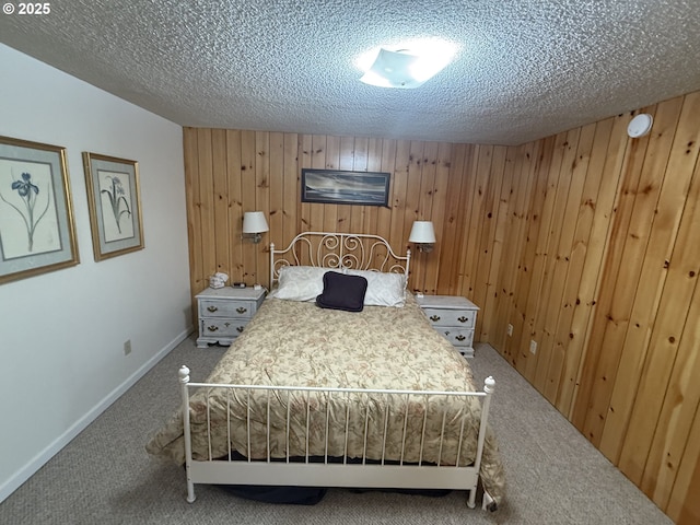 43605 State Highway 38 Unit 41, Reedsport, OR 97467 - bedroom with carpet, wooden walls, and a textured ceiling