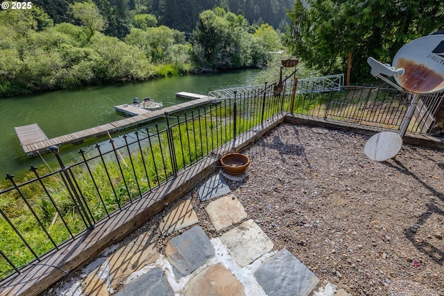43605 State Highway 38 Unit 41, Reedsport, OR 97467 - view of yard featuring a floating dock, a water view, and a forest view