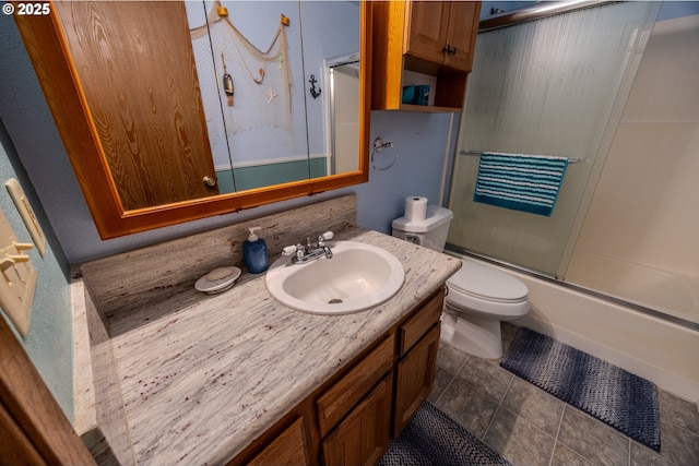 43605 State Highway 38 Unit 41, Reedsport, OR 97467 - bathroom featuring vanity, shower / bath combination with glass door, and tile patterned flooring