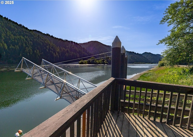 43605 State Highway 38 Unit 41, Reedsport, OR 97467 - deck featuring a water and mountain view and a forest view