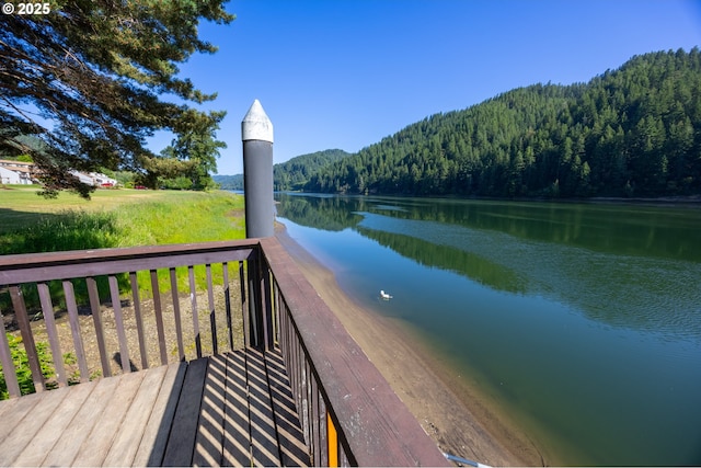 43605 State Highway 38 Unit 41, Reedsport, OR 97467 - deck with a wooded view and a water view