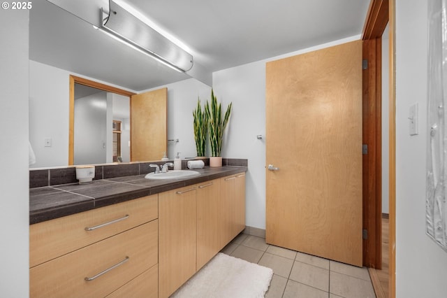 725 NW 10th Ave Unit 503, Portland, OR 97209 - bathroom featuring tile patterned floors and vanity