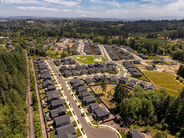 24200 SW Chestnut Ter, Sherwood, OR 97140 - aerial overview of property's location featuring a forest and nearby suburban area