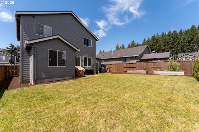 24200 SW Chestnut Ter, Sherwood, OR 97140 - back of property with a fenced backyard and a vegetable garden