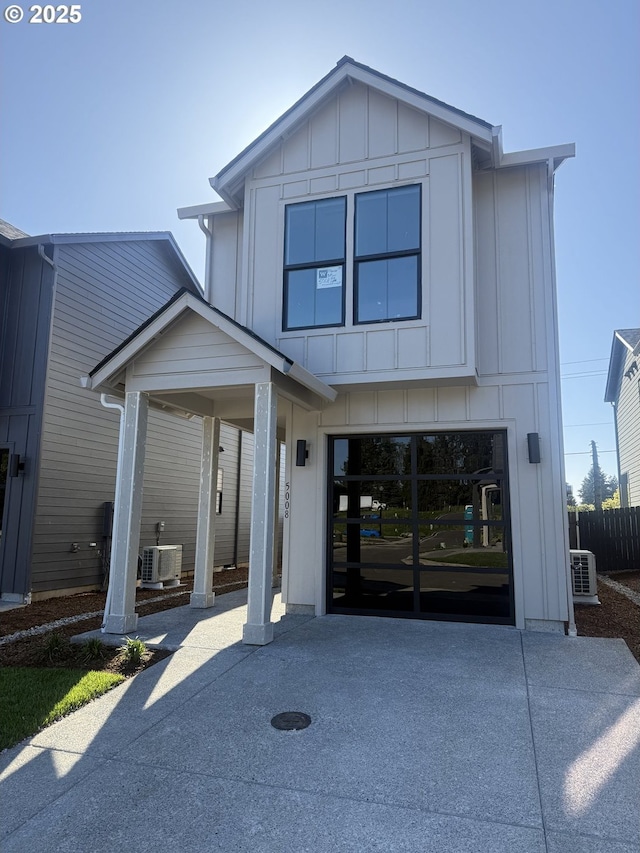 5008 NE 113th Loop, Vancouver, WA 98686 - view of front of home with board and batten siding, driveway, and central AC unit