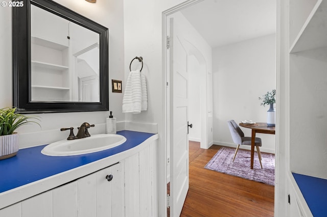 760 Jerome Ave, Astoria, OR 97103 - bathroom featuring wood finished floors and vanity