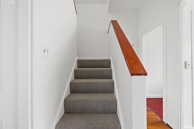 760 Jerome Ave, Astoria, OR 97103 - staircase featuring baseboards and wood finished floors
