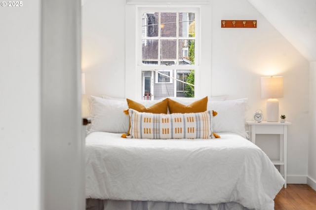 760 Jerome Ave, Astoria, OR 97103 - bedroom featuring wood finished floors and lofted ceiling