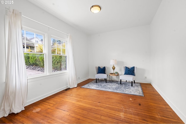 760 Jerome Ave, Astoria, OR 97103 - sitting room featuring wood finished floors and baseboards