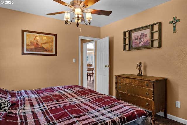 bedroom featuring carpet, ceiling fan, and baseboards