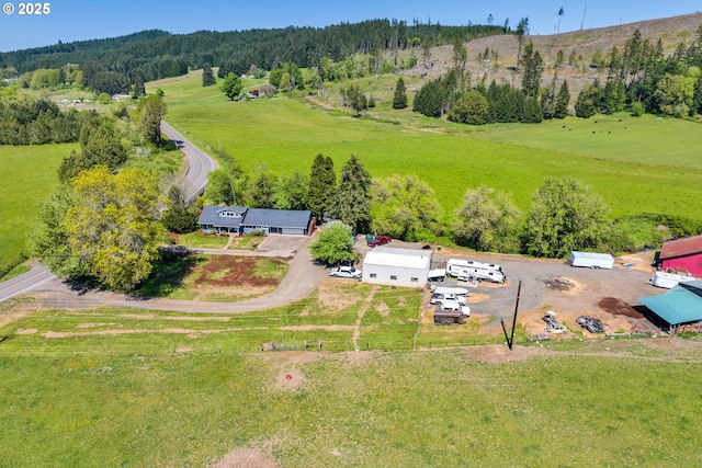 overview of rural landscape featuring a heavily wooded area
