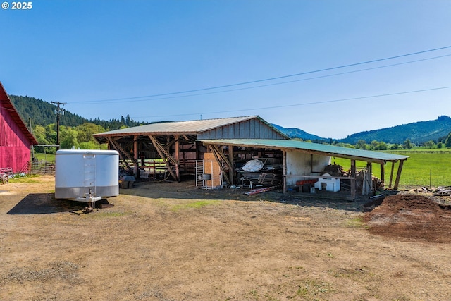 view of outdoor structure featuring a mountain view