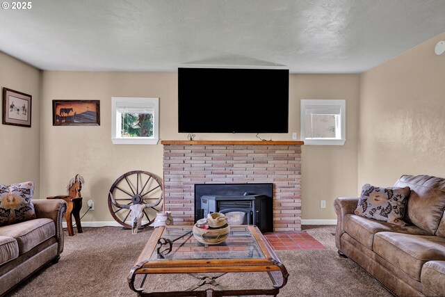 89353 Poodle Creek Rd, Noti, OR 97461 - living room with a textured ceiling, a ceiling fan, a fireplace, baseboards, and wood finished floors