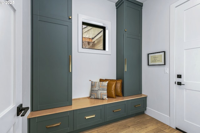 19550 Buck Canyon Rd, Bend, OR 97702 - mudroom featuring baseboards and light wood finished floors