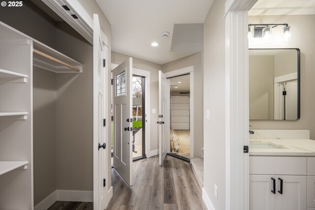 rear view of property with a garage