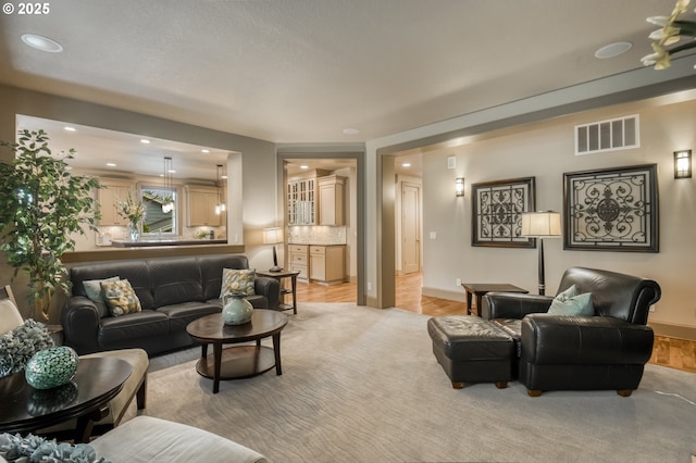 12483 SW Autumn View St, Tigard, OR 97224 - living room featuring recessed lighting and light wood-style floors