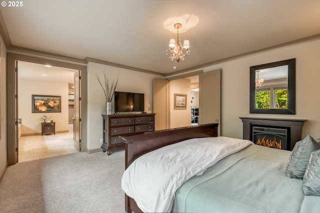 12483 SW Autumn View St, Tigard, OR 97224 - bedroom featuring a chandelier, a lit fireplace, and carpet