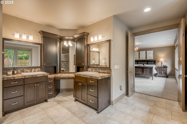 12483 SW Autumn View St, Tigard, OR 97224 - bathroom with backsplash, two vanities, tile patterned flooring, and recessed lighting