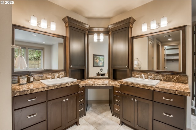 12483 SW Autumn View St, Tigard, OR 97224 - full bath featuring decorative backsplash, vanity, and tile patterned floors