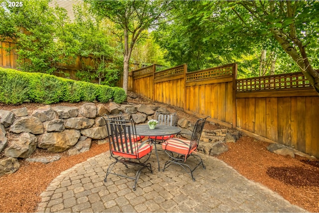 12483 SW Autumn View St, Tigard, OR 97224 - fenced backyard with a patio area and outdoor dining space