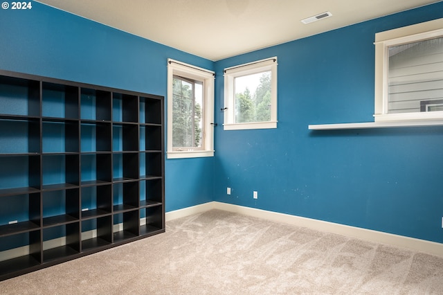 view of carpeted spare room