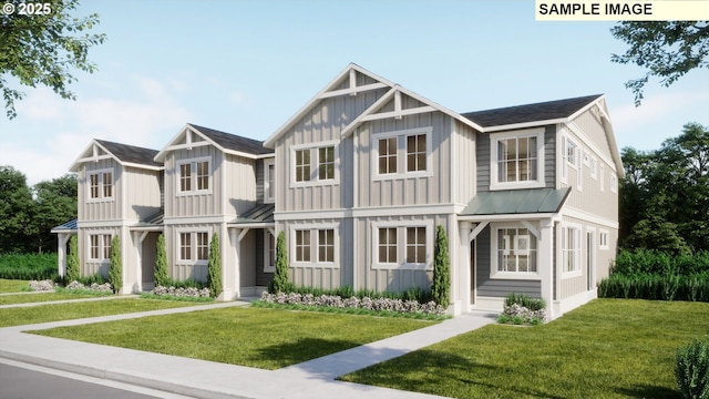 view of front of home featuring a front yard and board and batten siding