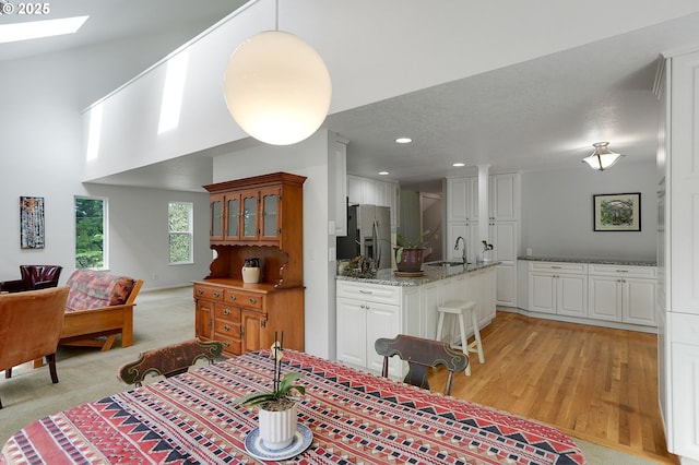 1946 Roberta Ave S, Salem, OR 97301 - dining space featuring recessed lighting, a skylight, and light wood finished floors