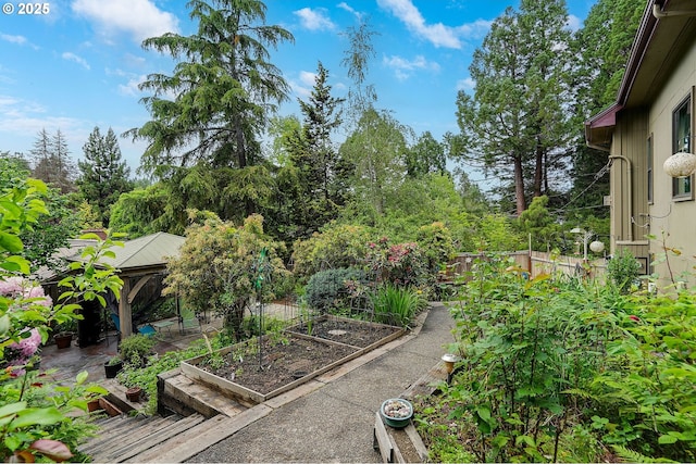 1946 Roberta Ave S, Salem, OR 97301 - view of yard featuring a garden, a gazebo, and view of scattered trees