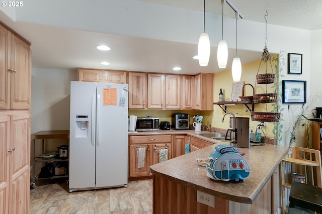1946 Roberta Ave S, Salem, OR 97301 - kitchen featuring white refrigerator with ice dispenser, a sink, light brown cabinetry, a peninsula, and recessed lighting