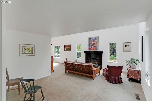 1946 Roberta Ave S, Salem, OR 97301 - living area featuring carpet flooring, a glass covered fireplace, and baseboards