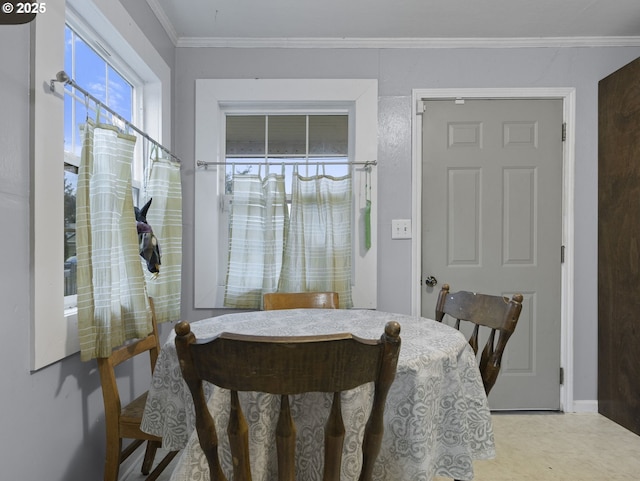 dining room with ornamental molding