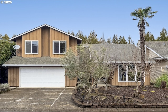 view of front of property with a garage