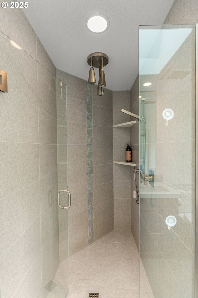 full bathroom featuring a shower stall