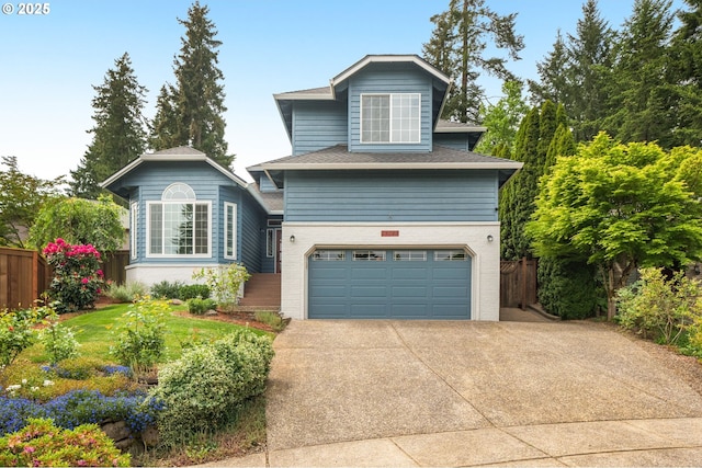 traditional-style house featuring fence, a garage, concrete driveway, and brick siding
